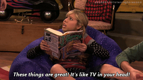 Girl Reading a Book On A Sofa